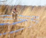 Mellisa Putzer in the tall grass. ©Brian Nelson