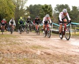In pouring rain, Brandon “Big Red” Gritters (Rock n’ Road) shoots to an early Men’s A lead. © Phil Beckman