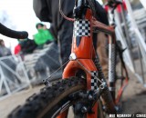 Checkered tape mask the Blue branding, but the Challenge Limus Team Edition tubulars and Shimano CX70 cantilevers are fully visible. © Meg McMahon Checkered tape mask the Blue branding, but the Challenge Limus Team Edition tubulars and Shimano CX70 cantilevers are fully visible. © Meg McMahon