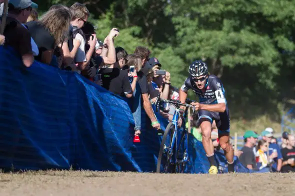 Jamey Driscoll pushing past the beer garden on Day 1 of Gloucester. © Todd Prekaski