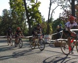 The leaders of the Elite Men's race round the course. © Neil Schirmer