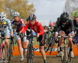 The Women's A field goes over the barriers early on the first lap. © Pat Malach