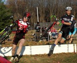 Patrick Blair, left, and Tim Rugg charging over the barriers. © Neil Schirmer