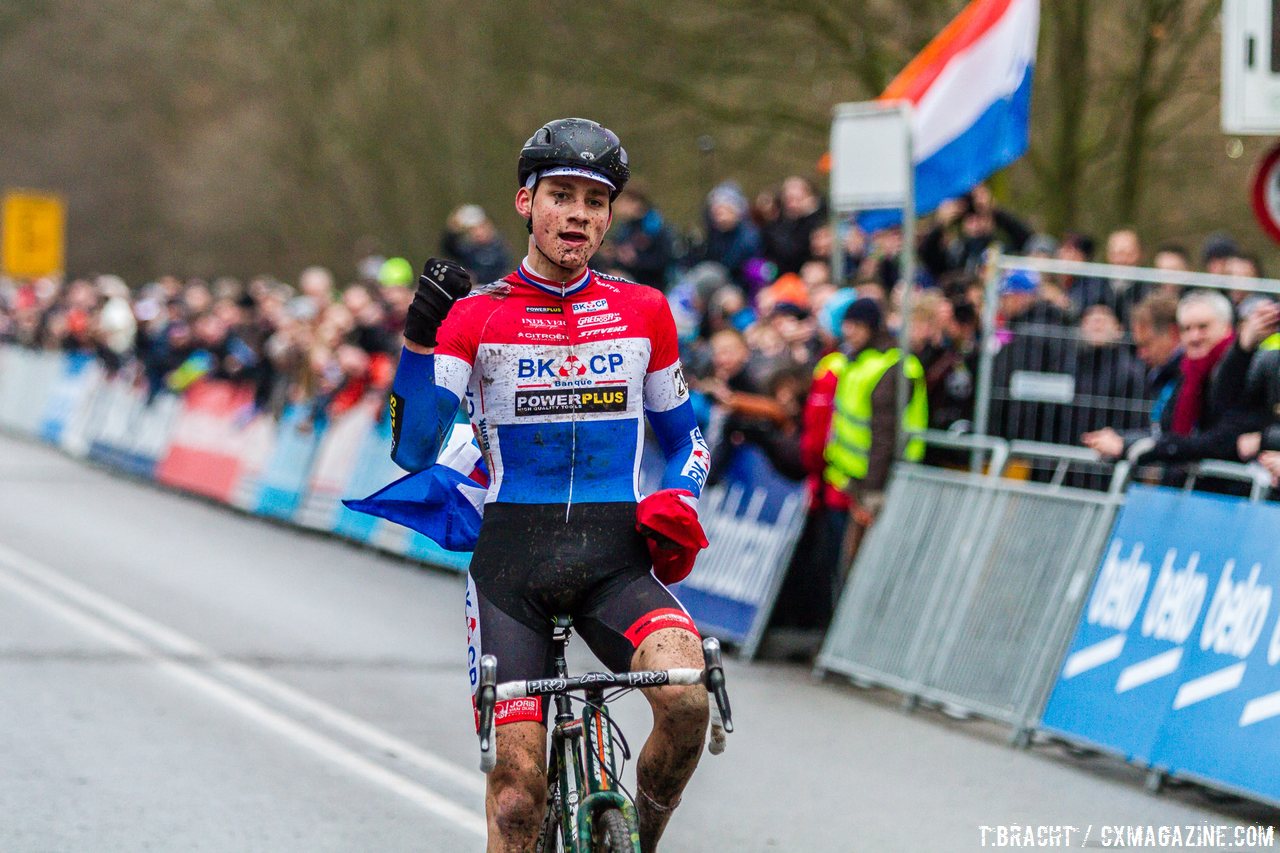 Van der Poel celebrates with the Dutch flag in hand in his home country at Hoogerheide. © Thomas van Bracht / Cyclocross Magazine