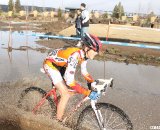 Gage Hecht drives through the muck © Cyclocross Magazine