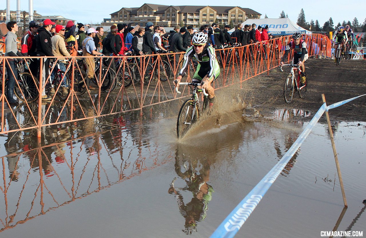Powers gets the puddle-shot. 2010 USA Cycling Cyclocross National Championships. © Cyclocross Magazine