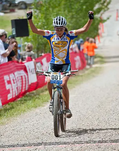 Sophomore Shayne Powless (Independent) celebrates victory in the Varsity Girl\'s race during the NICA California State Championships at Loma Rica Ranch in Grass Valley, California on May 16, 2010. © Robert Lowe. 