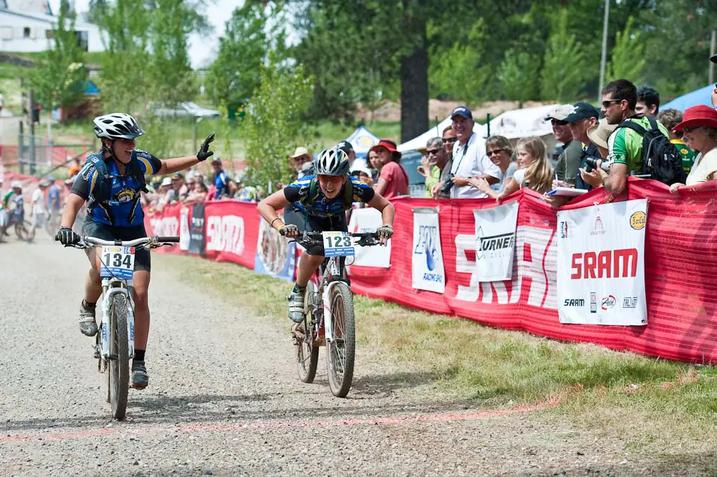 Terra Linda teammates Nicole Rehder (134) and Katherine King (123) enjoy finishing the JV Girl\'s race during the NICA California State Championships at Loma Rica Ranch in Grass Valley, California on May 16, 2010. © Robert Lowe. 