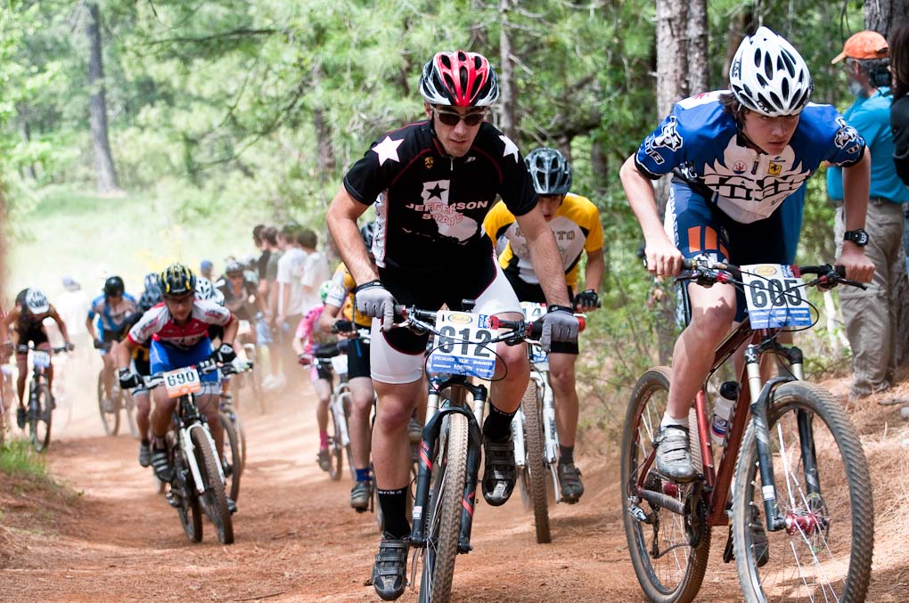 Bob Siegel of Tamalpais High (605) leads Jefferson\'s Carson Schmeck (612) up a fast climb at the Soph Boy\'s Division race during the NICA California State Championships at Loma Rica Ranch in Grass Valley, California on May 16, 2010. © Robert Lowe. 
