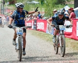 Terra Linda teammates Nicole Rehder (134) and Katherine King (123) enjoy finishing the JV Girl's race during the NICA California State Championships at Loma Rica Ranch in Grass Valley, California on May 16, 2010. © Robert Lowe. 