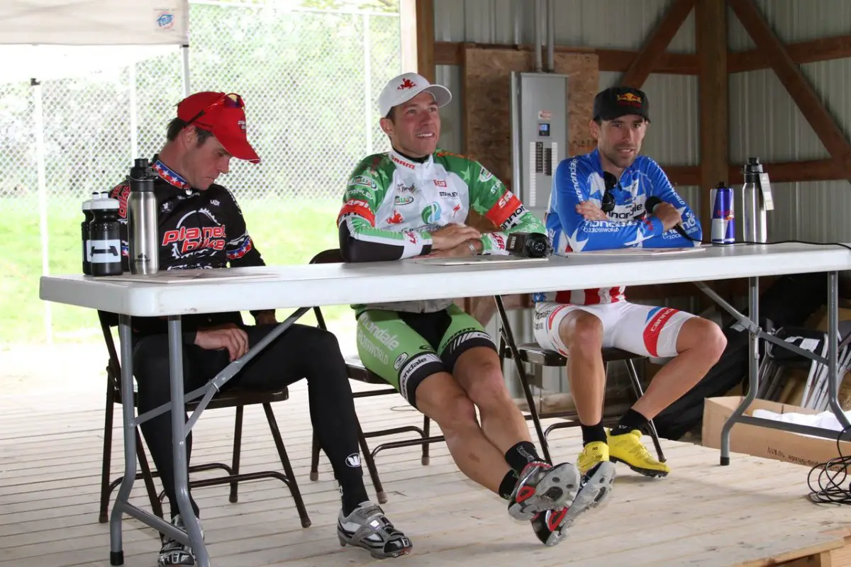 The men at the press conference after the race. © Amy Dykema