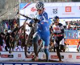 Tim Johnson (r) chases an Italian rider through the barriers. ? Bart Hazen