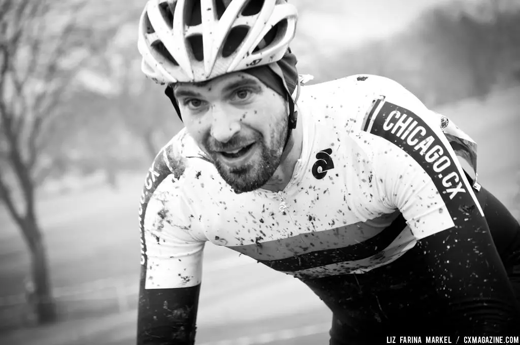 Jonathan Fairman (Chicago.CX) enjoying the mud-filled course in the 30-plus. ©Liz Farina Markel