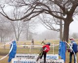 One of the juniors racers gets some support while tackling the barriers. ©Liz Farina Markel