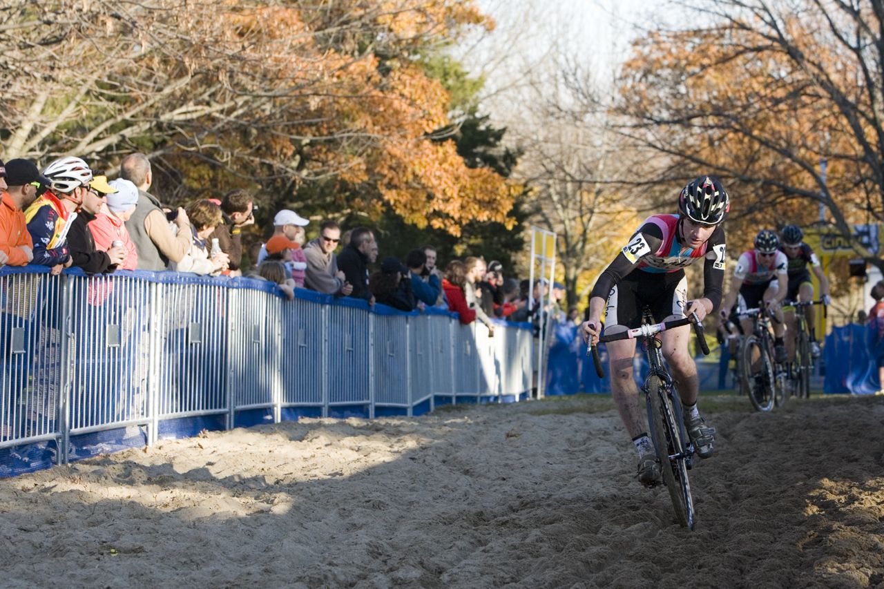 Zach McDonald, #23 (Rapha-Focus) leads the field across the sand during the first lap of the Men\'s Elite Race.