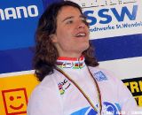 Vos rejoices on the podium by singing her national anthem