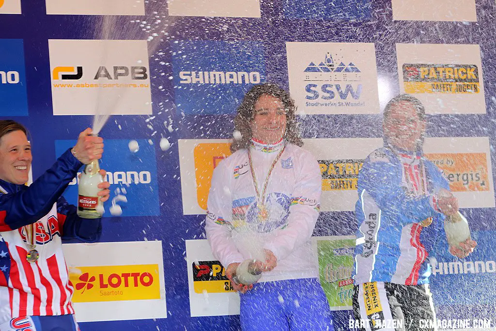 The champagne showers on the podium