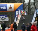 Mathieu van der Poel, youngest son of Adrie, turns onto one of the bridges on the course ©Bart Hazen