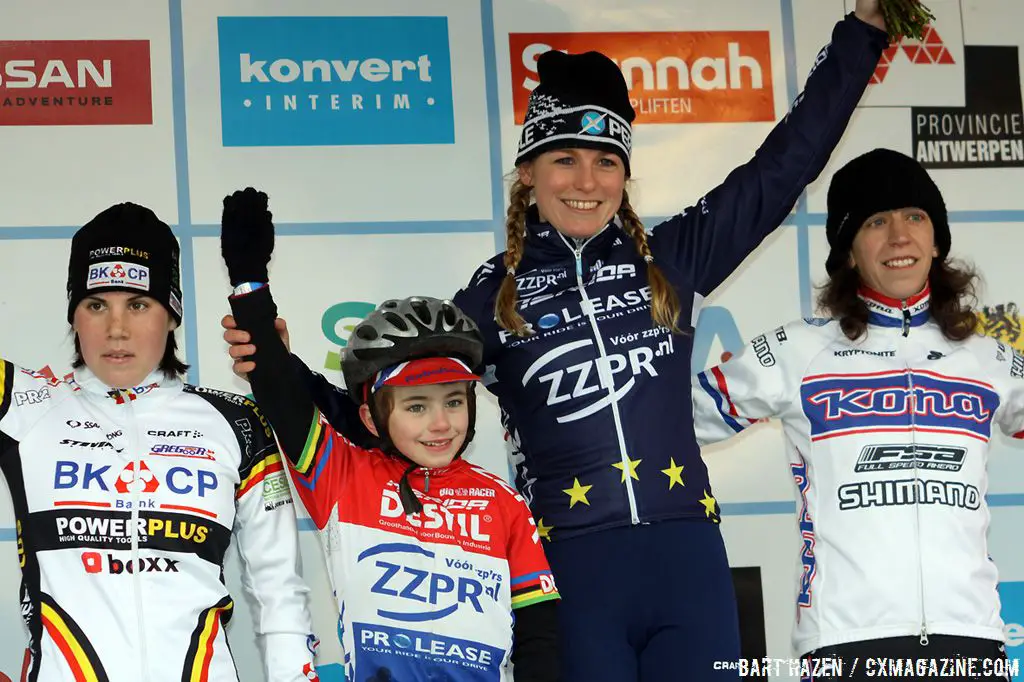 The women's podium in Oostmalle: Daphny van den Brand, Sanne Cant, Helen Wyman and a special fan of Daphny.