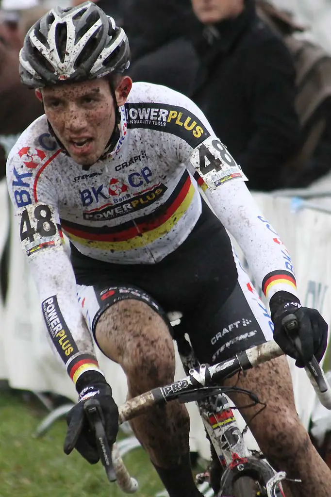 Phillipp Walsleben tries to breathe through the mud in the air. © Bart Hazen