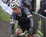 Jonathan Page works to find a line through a muddy corner. © Bart Hazen