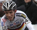 Phillipp Walsleben tries to breathe through the mud in the air. © Bart Hazen