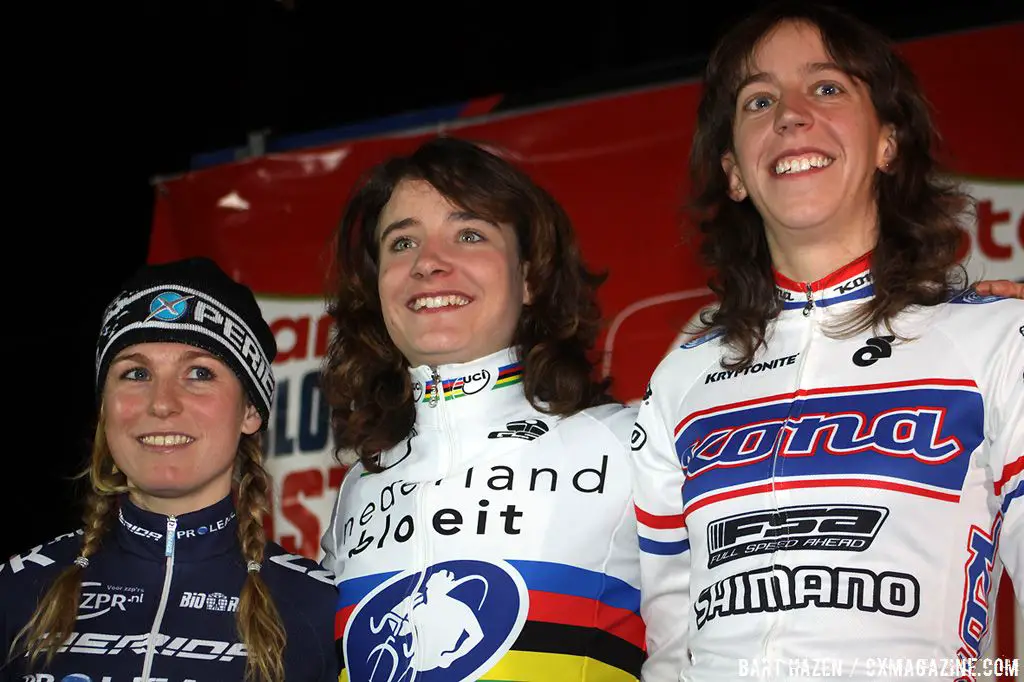 The women\'s podium at the Cyclo Cross Masters; winner Marianne Vos, second Daphny van den Brand and third Helen Wyman.