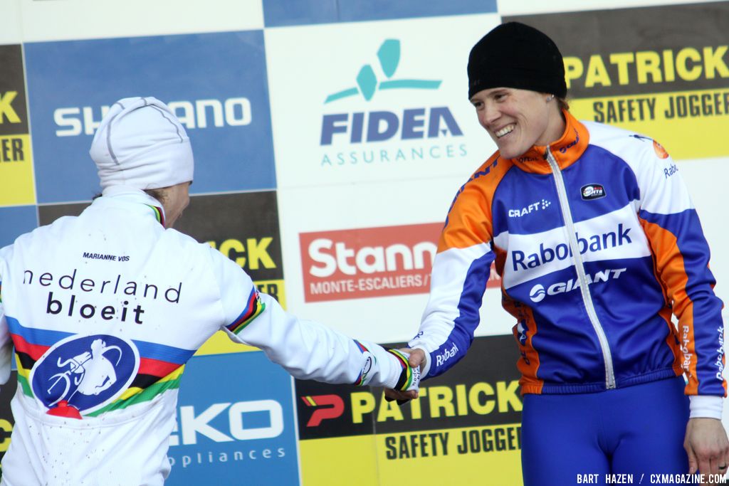 Katie Compton congratulates new teammate Marianne Vos on the win © Bart Hazen