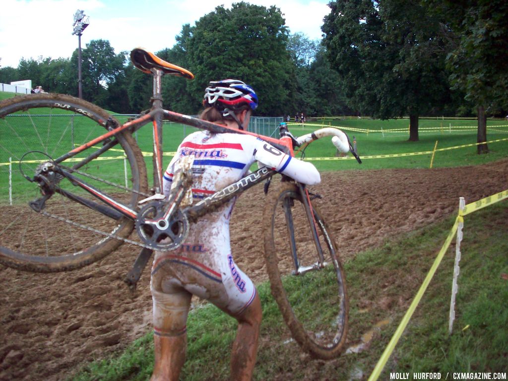 Helen Wyman running through the mud. © Cyclocross Magazine 