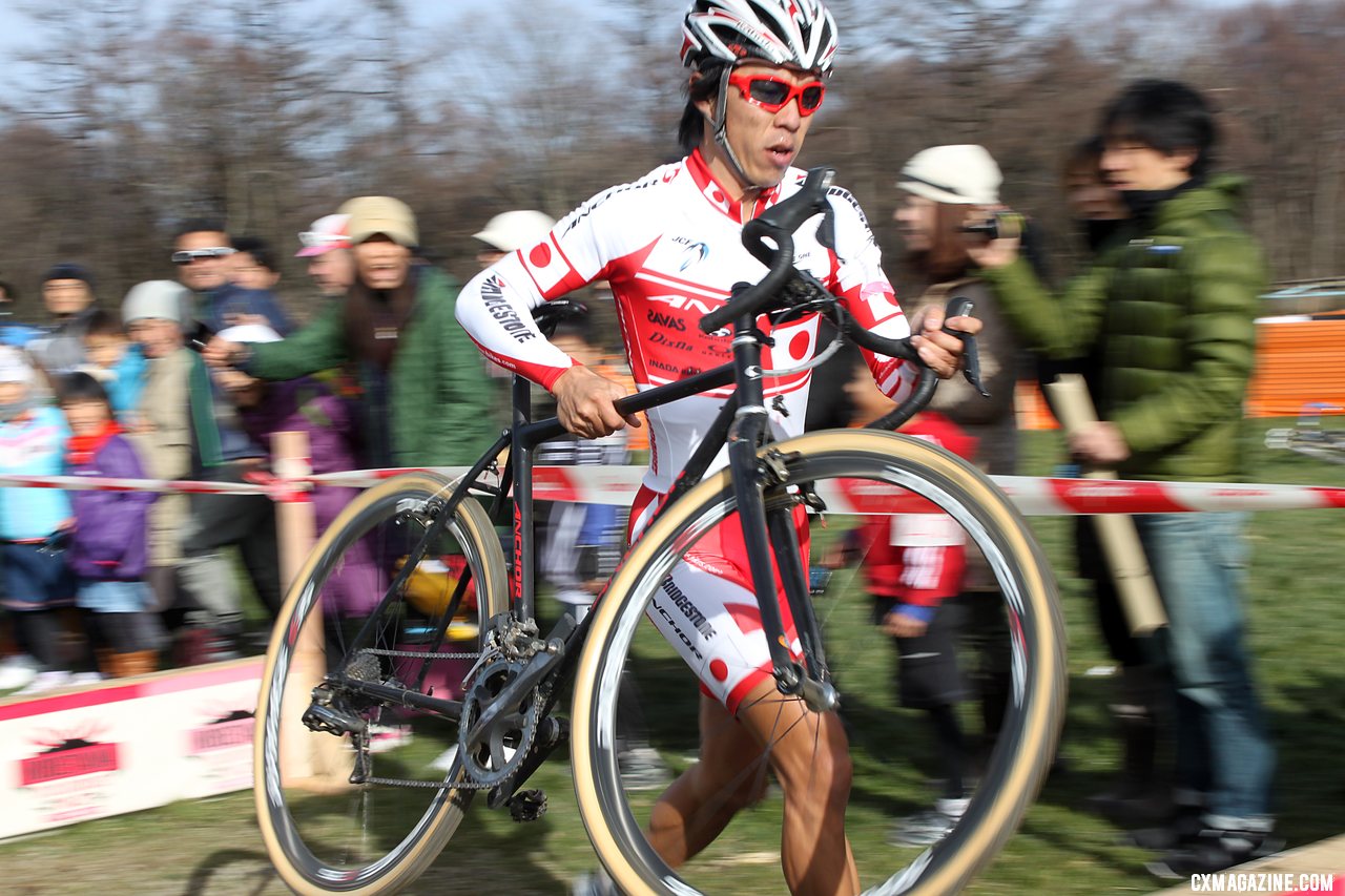 Tsujiura chasing early on in the 2011 Nobeyama, Japan UCI Cyclocross Race. © Cyclocross Magazine