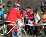 A Santa stopped along the course in the singlepseed race to give out candy to the kids. 2011 Nobeyama, Japan UCI Cyclocross Race. © Cyclocross Magazine