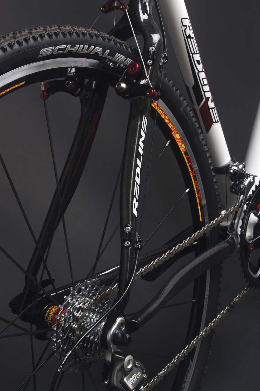 The clear finish lets the carbon weave shine on the elegantly curved seatstays. courtesy Redline Bicycles