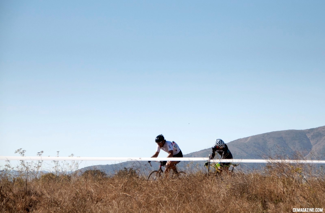 Paul Thai crests the hill but has little time to enjoy the scenery in the Masters 45+ B race. ©Cyclocross Magazine