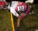 Handups and crowds distracted this rider, causing her to hit the barriers. ©Cyclocross Magazine