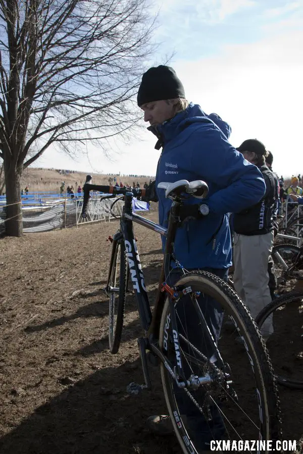 Mark Legg readies for a bike exchange in the pit. 2012 Cyclocross National Championships, Elite Women. © Cyclocross Magazine