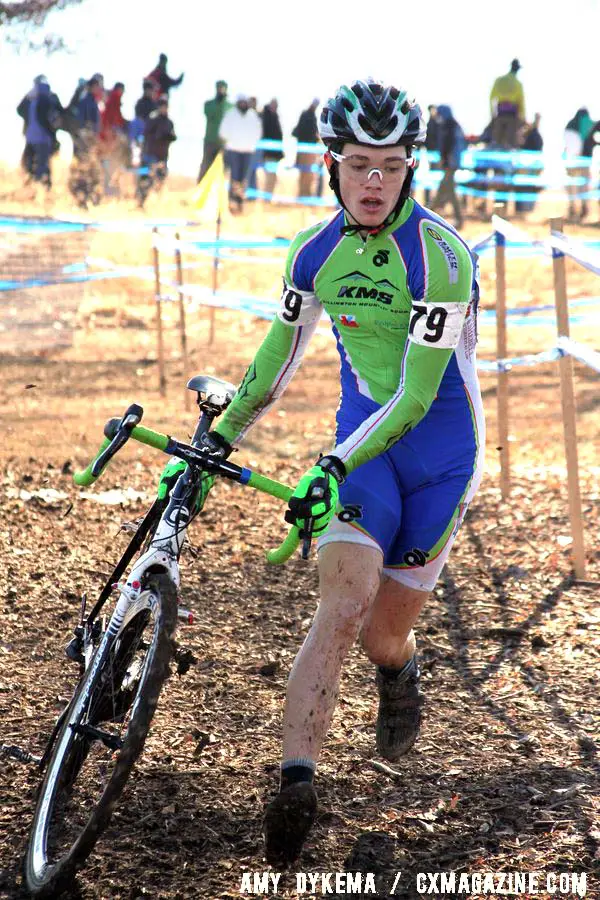 Ansel Dickey runs a muddy corner. ©Amy Dykema