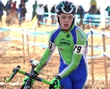 Ansel Dickey runs a muddy corner. ©Amy Dykema