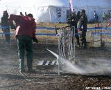 The pits were busy during the muddy Junior race. © Amy Dykema