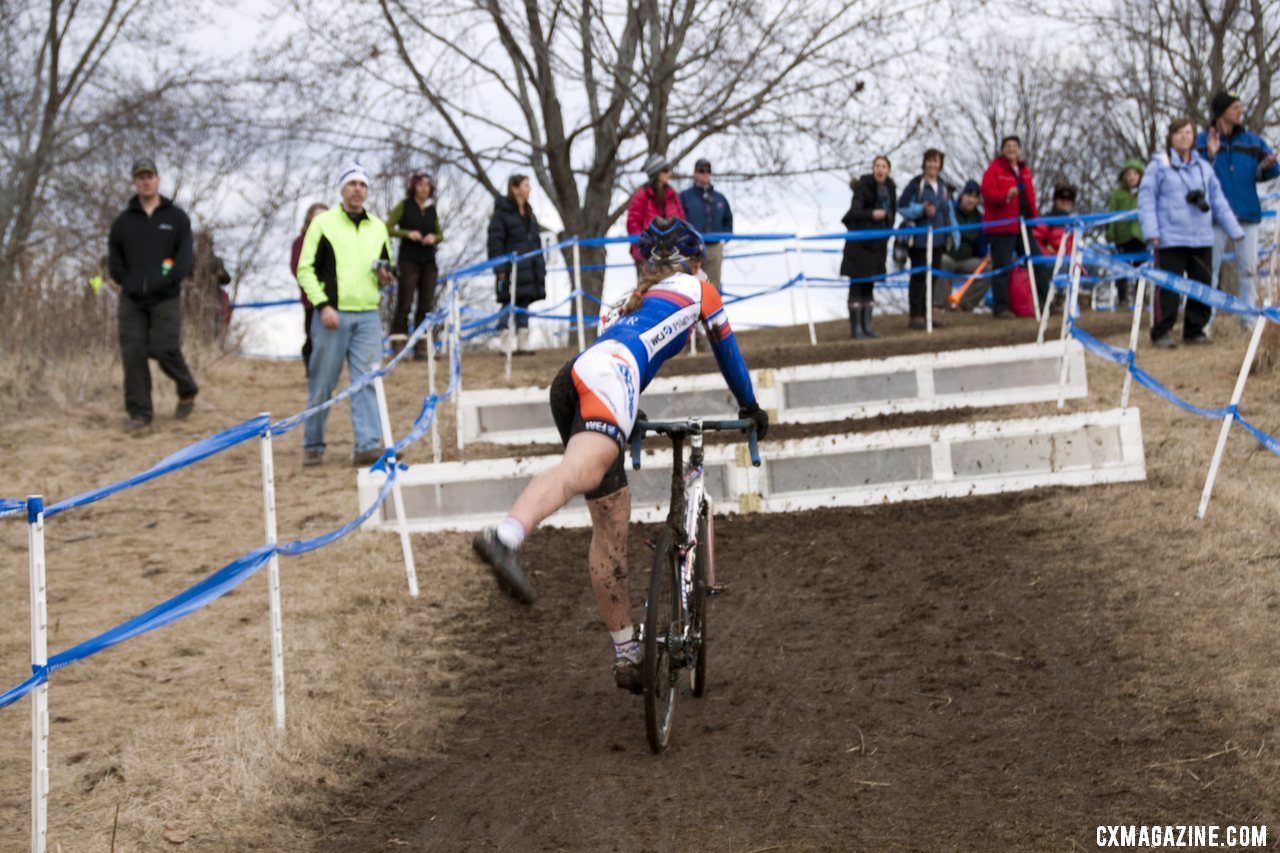 A ride dismounts into the uphill barriers - Junior Women, 2012 Cyclocross National Championships. © Cyclocross Magazine