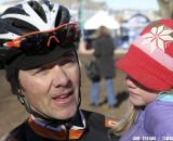 Brandon Dwight celebrates with a little one. 2012 Cyclocross National Championships, Masters Men 40-44. ©Amy Dykema