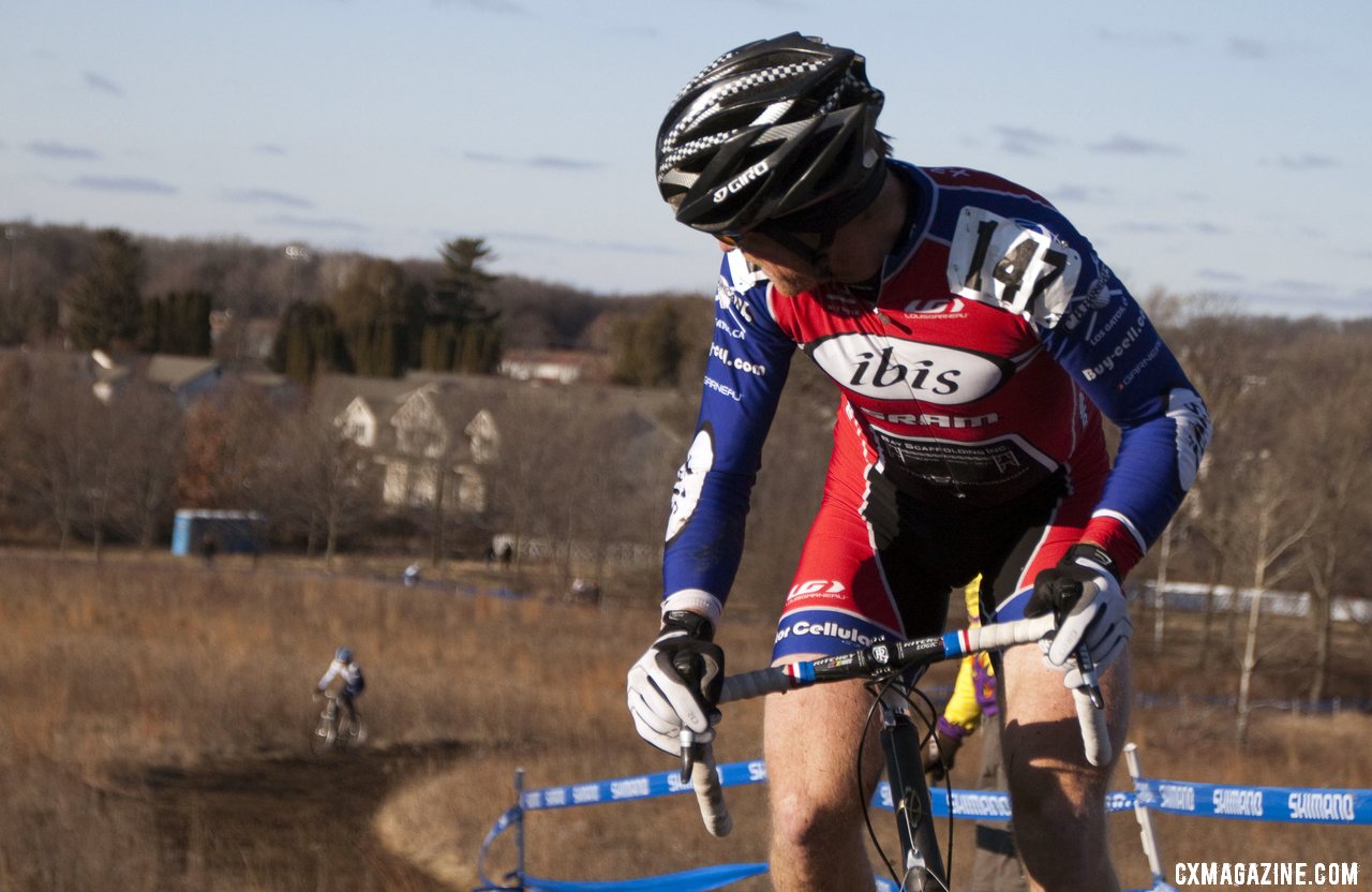 Don Myrah (Buy Cell / Ibis) checks his gap over Cariveau (Moots) with two to go. Masters Men 45-49, 2012 Nationals. © Cyclocross Magazine