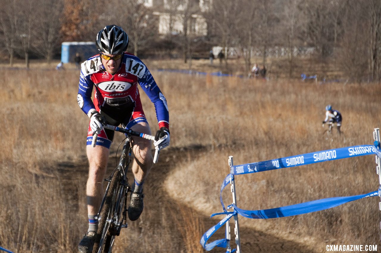 Don Myrah attacks the climb with Jon Cariveau in the distance. 2012 Cyclocross National Championships, Masters Men 45-49. © Cyclocross Magazine