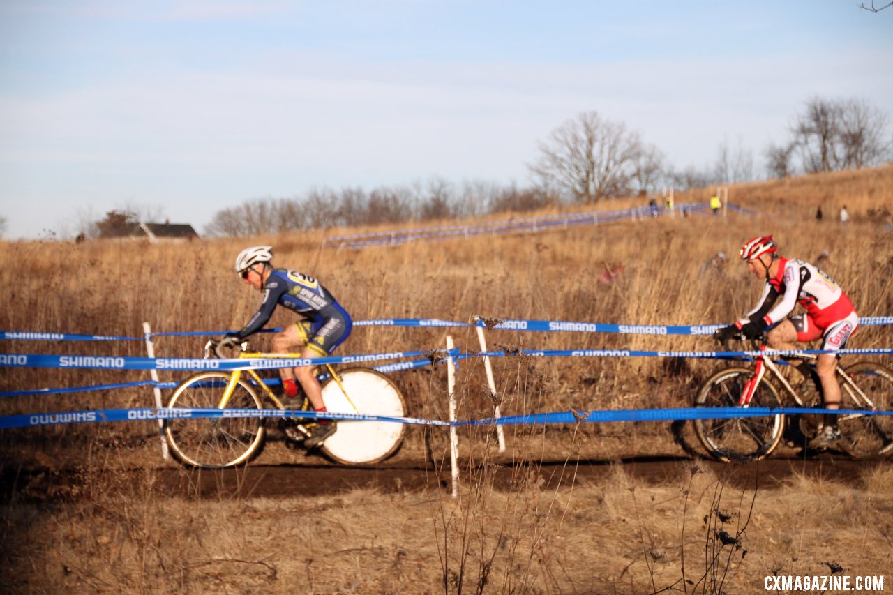Race winner Paul Curley powers towards the finish with Kreiss in tow on lap one. 2012 Cyclocross National Championships, Masters 55-59. © Cyclocross Magazine