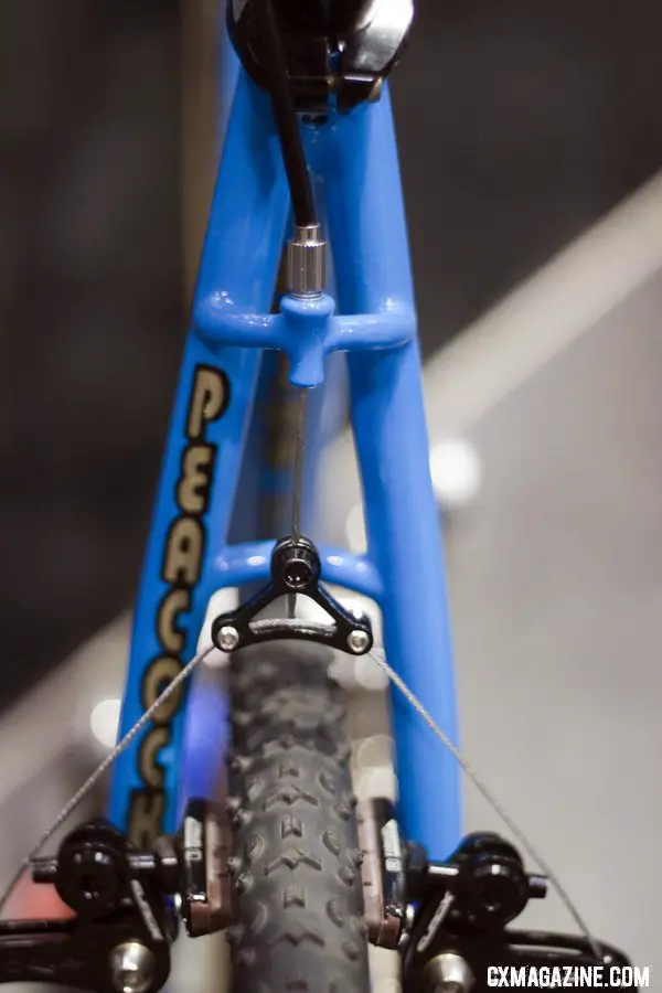 Peacock Groove\'s rear brake cable hanger is a sturdy one, supported by both seatstays. NAHBS 2012.  ©Cyclocross Magazine