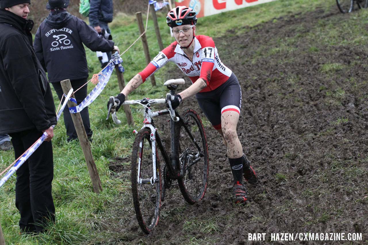 Maureen Bruno Roy (Bob\'s Red Mill p/b Seven Cycles) running one of the mud sections. © Bart Hazen / Cyclocross Magazine