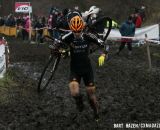 Jeremy Durrin (Optum p/b Kelly Benefit Strategies) runs through the mud. © Bart Hazen / Cyclocross Magazine