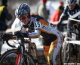 Amanda Miller (Optum Pro Cycling) smiles at the struggles of racing in muddy Badger Prairie County Park.  © Meg McMahon