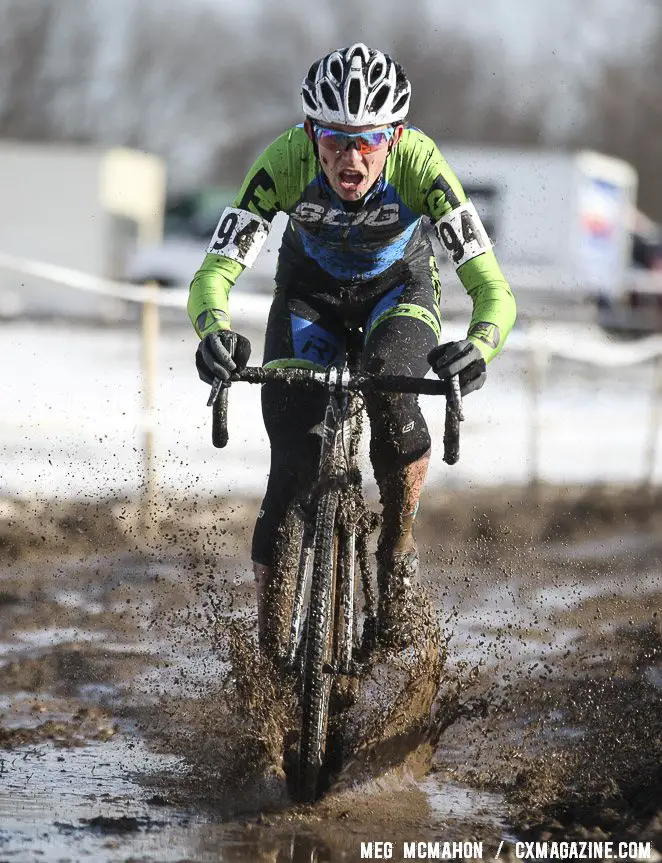 Tyler Schwartz focused on finding fast lines in the mud. Junior Men 17-18, 2013 Cyclocross National Championship. © Meg McMahon