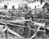 Gabriel Ion finds reason to smile heading towards the pits. Masters Men 40-44, 2013 Cyclocross Nationals. © Meg McMahon