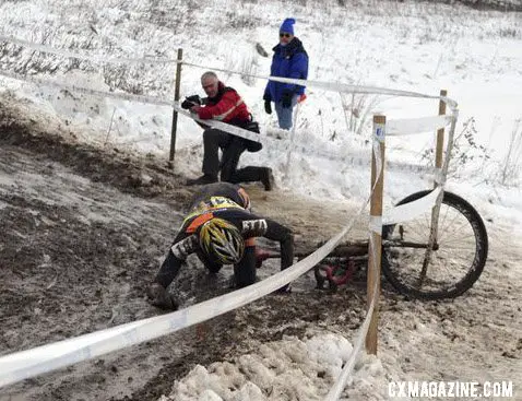 Lennard Zinn takes a hard face plant into an icy puddle.  ©Cyclocross Magazine